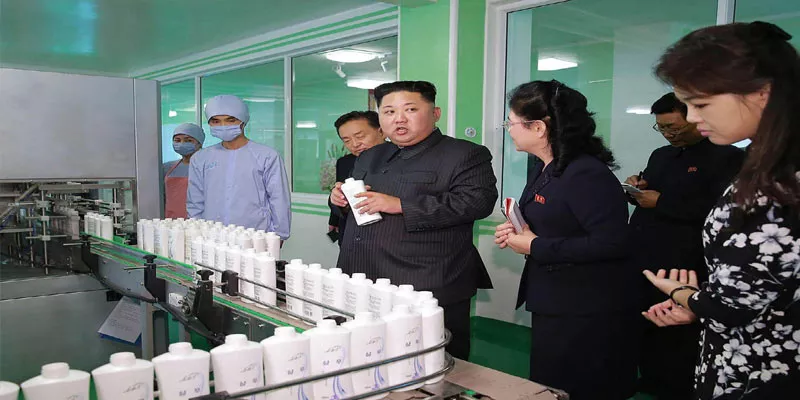 Kim Jong-un visits cosmetics factory with wife and sister 