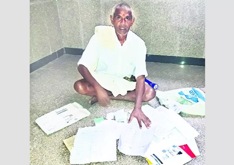 old man trying to get job for his son in telugu ganga loses home quota - Sakshi