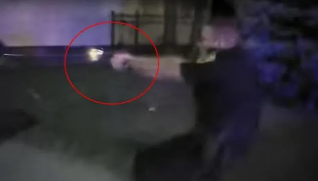 Police bodycam shows officer fatally shoot a man who ran