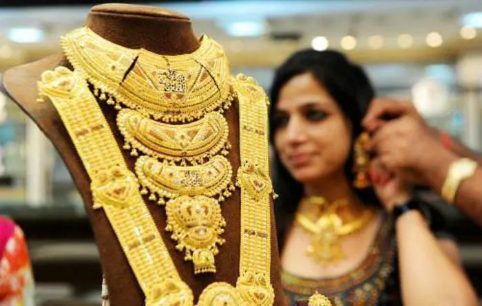 New limit for reporting gold transactions soon - Sakshi