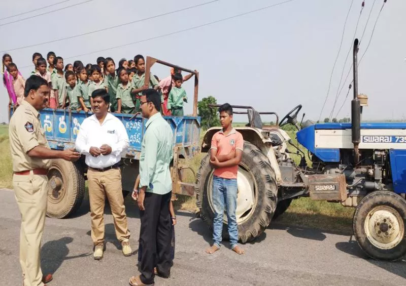 14years kid driving tractor with 70members students