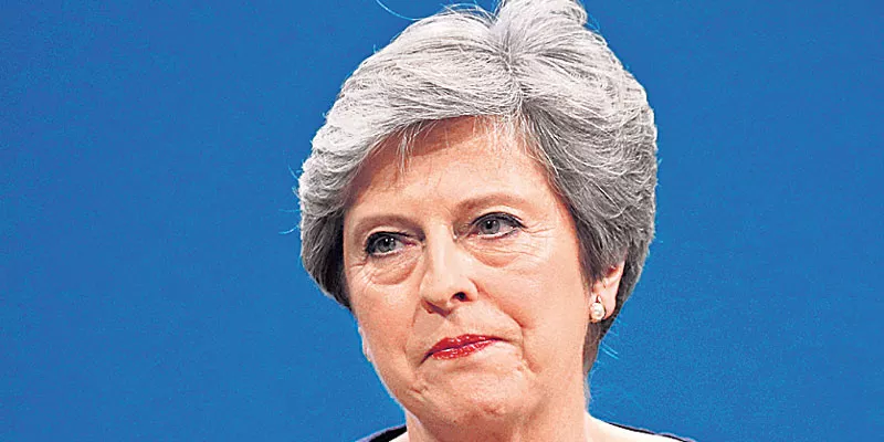 Rebel MPs prepare no-confidence letter against British PM Theresa May - Sakshi