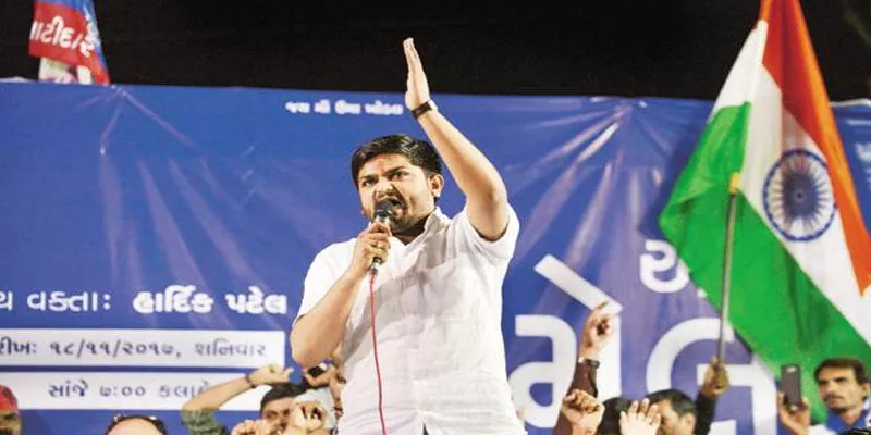 Hardik Patel’s PAAS seals deal with Congress on Patel quota - Sakshi