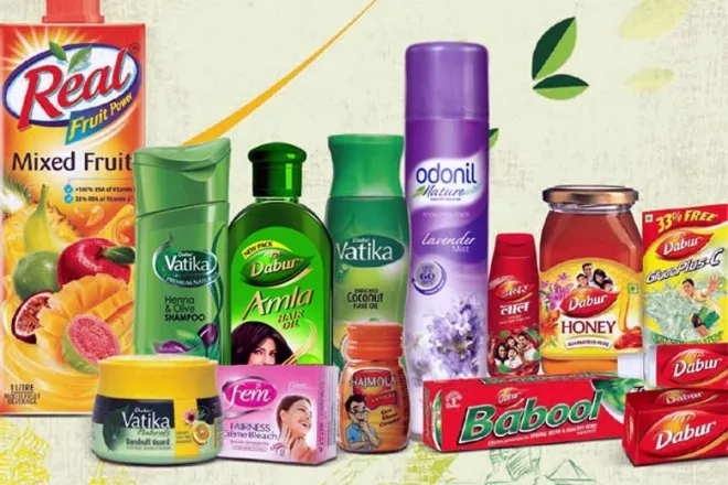 GST Impact: Dabur cuts shampoo, air freshener, skin care prices - Sakshi