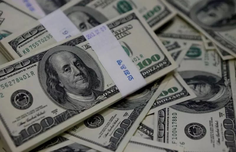 Dollar sinks on Fed inflation fears, weak data - Sakshi