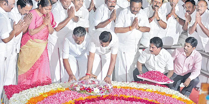 EC gives two-leaves symbol to E Palaniswami- O Panneerselvam faction - Sakshi