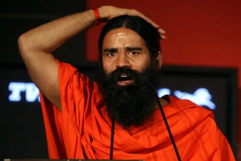 Baba Ramdev backs Assam minister on cancer remark  - Sakshi - Sakshi - Sakshi - Sakshi