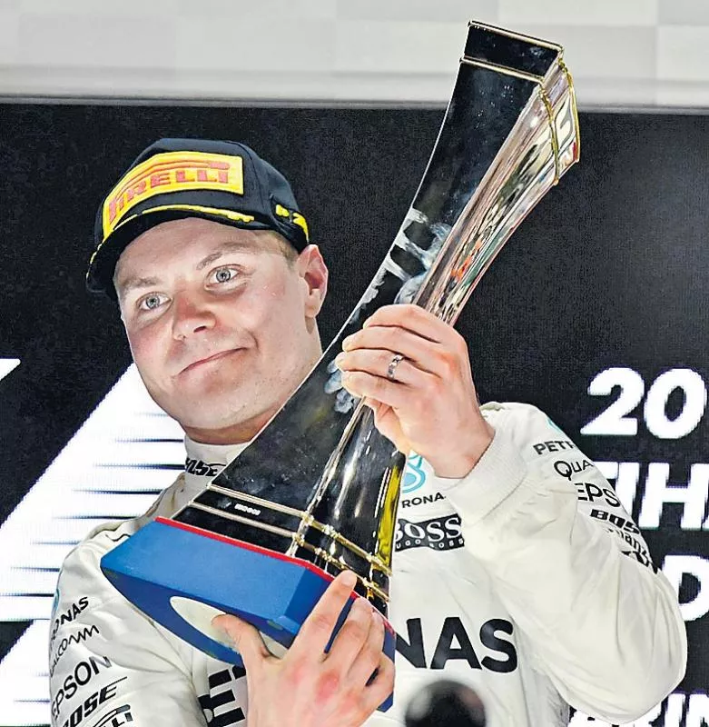 Serene Valtteri Bottas beats Lewis Hamilton at the Abu Dhabi Grand Prix - Sakshi