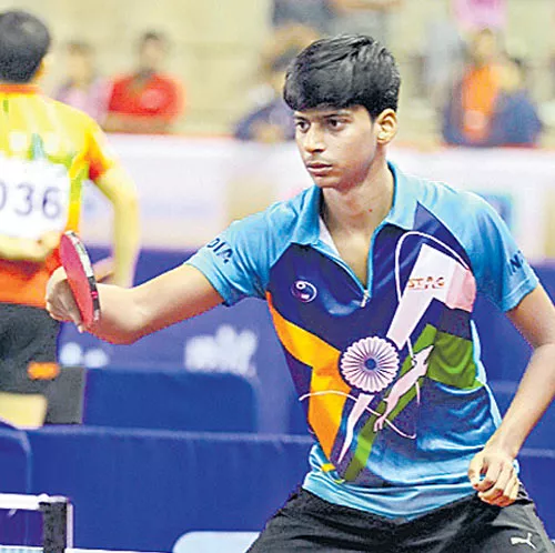 snehit victory help to india top on the table in table tennis - Sakshi