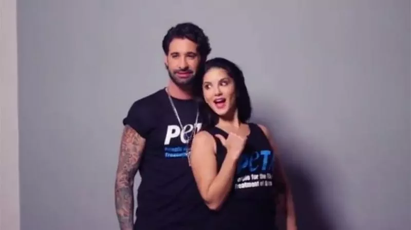 Sunny Leone and husband Daniel Weber pose nude for PeTA - Sakshi