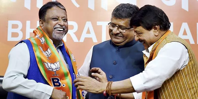 Former TMC leader Mukul Roy joins BJP - Sakshi