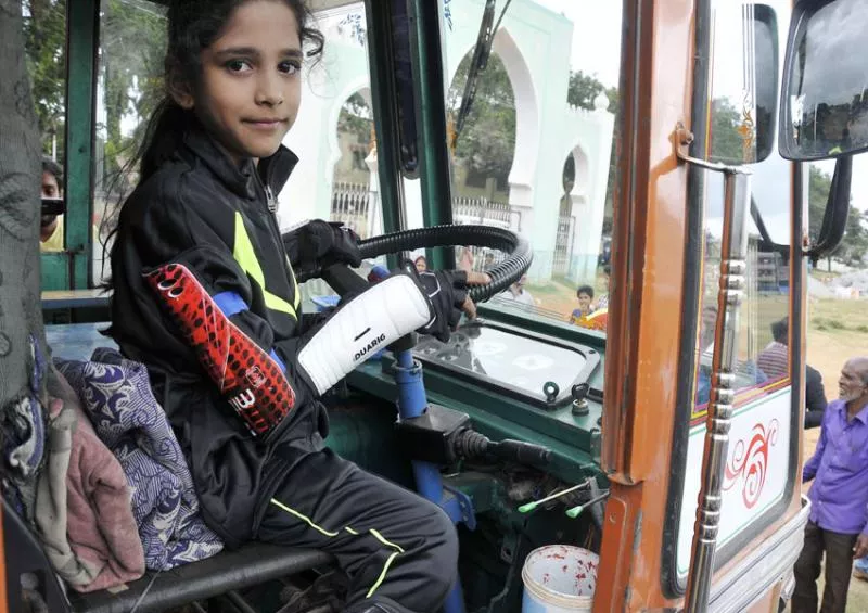 7-year-old city girl drives 10-wheeled lorry ! - Sakshi