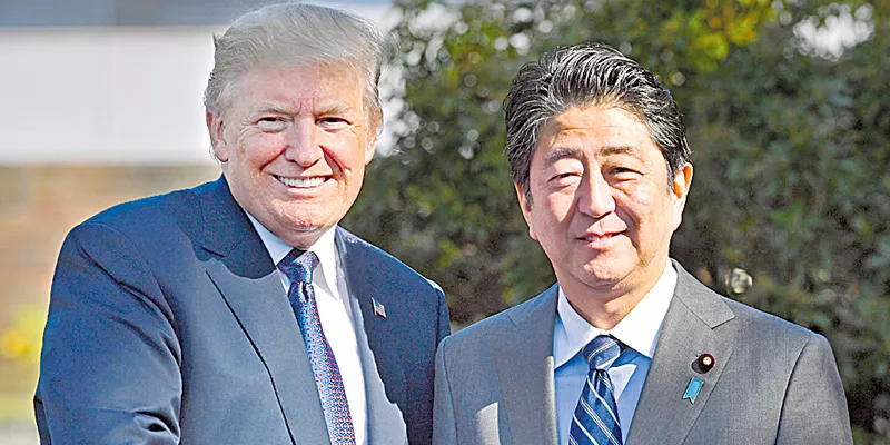 Donald Trump begins 12-day Asia trip, Japan first port of call - Sakshi