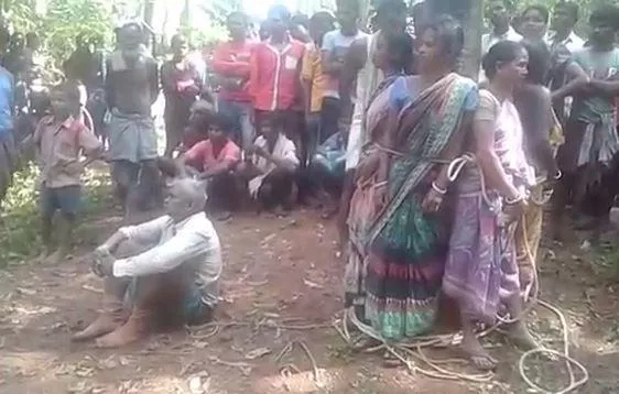 horrifying moment women are tied to a tree in odisha - Sakshi