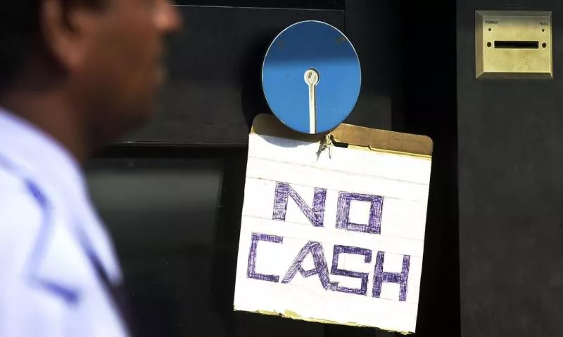 'No cash' boards back at ATMs - Sakshi