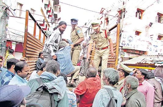 Police search about beggers at the city - Sakshi