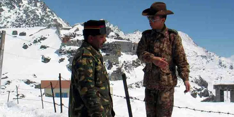 China hints at maintaining sizeable presence of troops near Doklam in winter - Sakshi