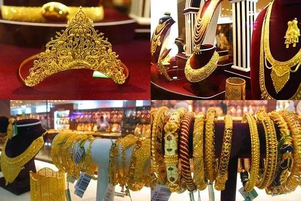 Gold prices slump on low demand, weak global cues - Sakshi