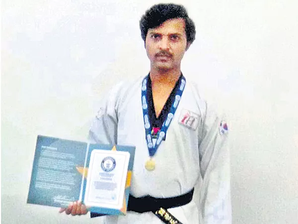 Highest Taekwondo Kick Guinness Record - Sakshi