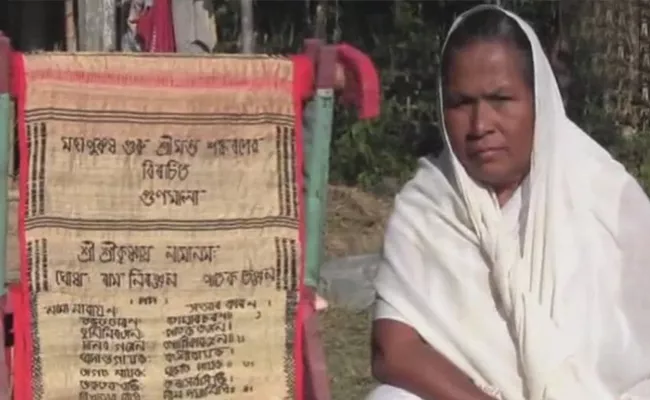 Assam Woman weaves Bhagwat Geeta on cloth - Sakshi