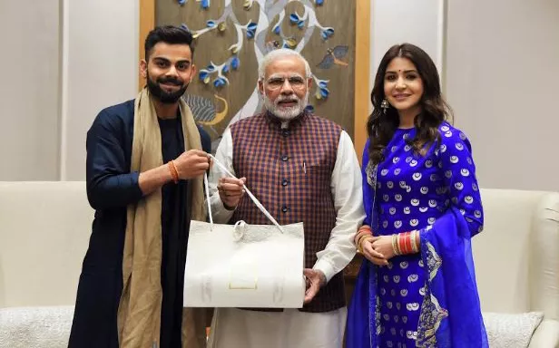 Prime Minister congratulated Virat Kohli and Anushka Sharma - Sakshi