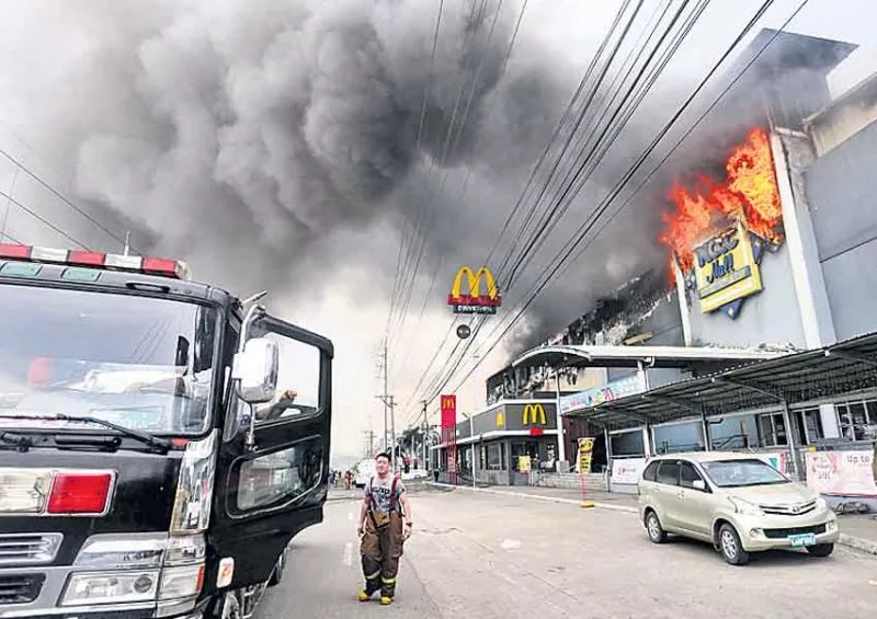 BPO group seeks justice for dead colleagues trapped in Davao mall fire - Sakshi