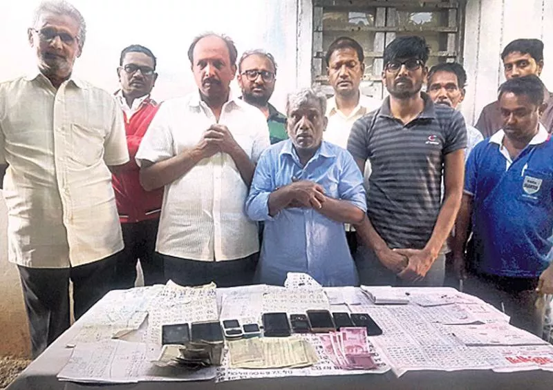 father and son arrest in Speculators  - Sakshi