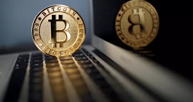 Trade in bitcoins at your own risk - finance ministry  - Sakshi