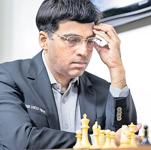 Vishwanathan Anand won the bronze medal in the championship - Sakshi