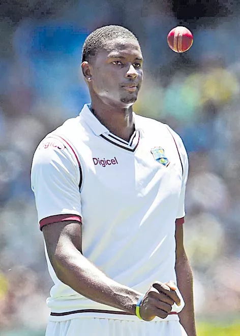 Windies skipper Holder banned for 2nd NZ Test - Sakshi