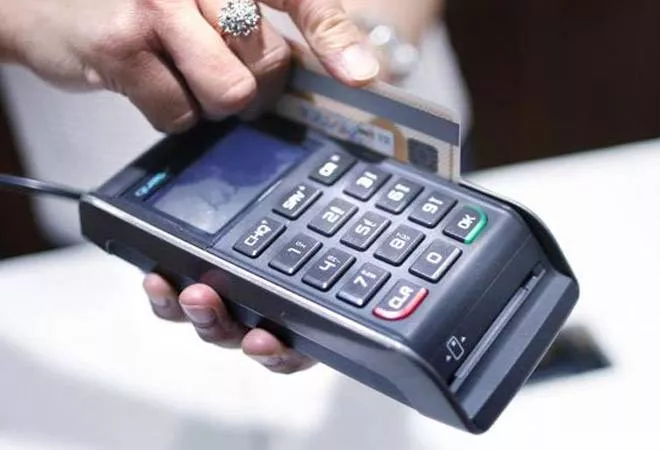 To promote cashless transactions, RBI reduces MDR charges for debit cards - Sakshi