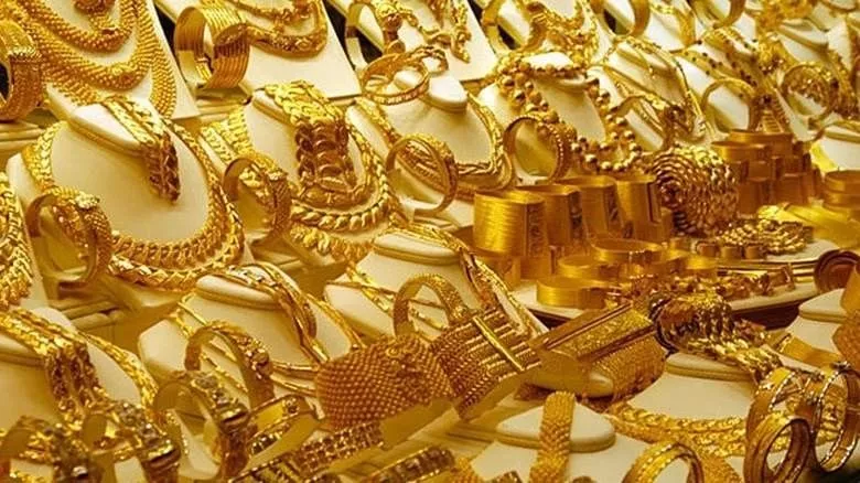 Gold, silver trade lower - Sakshi