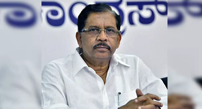 KPCC President Parameshwar fired on yogi - Sakshi