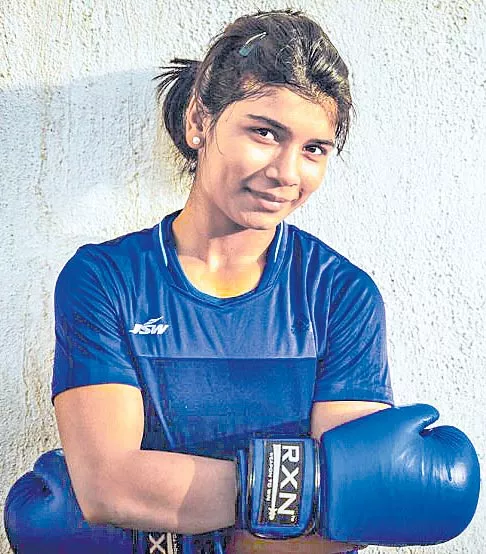 Telangana Boxer Nikhat Zareen took the medal - Sakshi