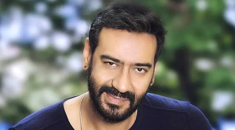 Ajay Devgn quits smoking on the sets of Raid  - Sakshi