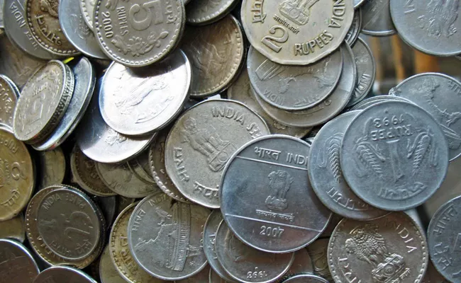 Government resumes coin production, but mints to work at slow pace - Sakshi