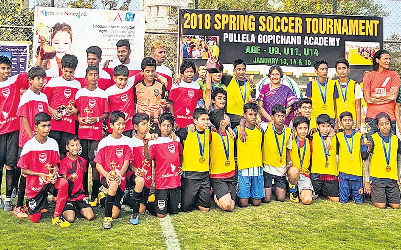 petra sports academy gets double dhamka in spring socker - Sakshi