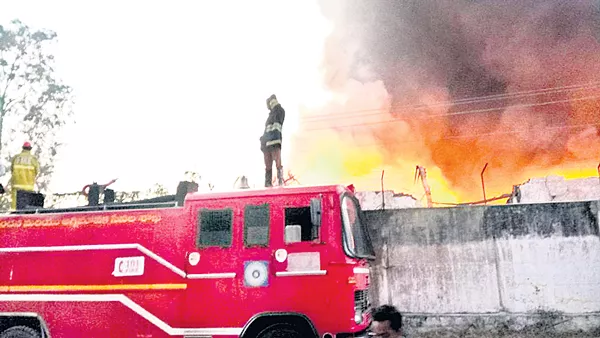 Fire Accident in Agarwal Rubber Godown at Patancheru - Sakshi