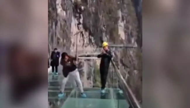 600 Feet In The Sky, Workers Smash Glass Bridge - Sakshi