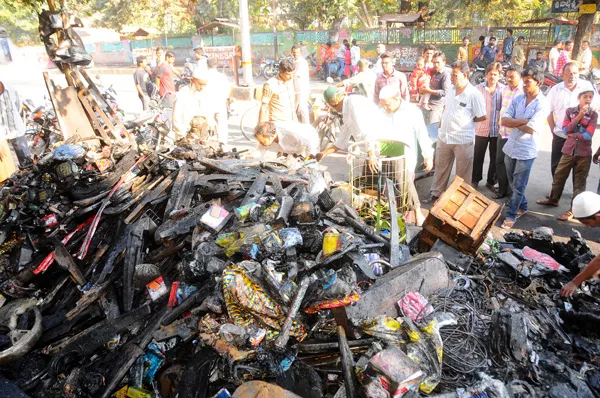 Fire accident in automobiles shop - Sakshi