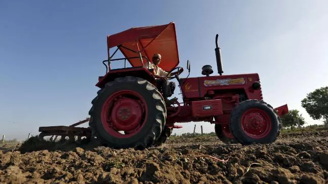 Loan recovery agents take away UP farmer tractor, crush him - Sakshi