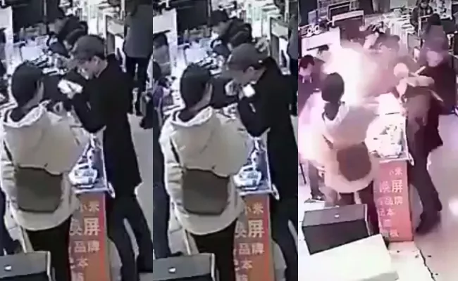 Man Bites An iPhone Battery In China Phone Explodes - Sakshi