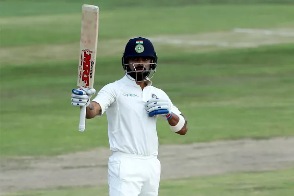 Virat Kohli Half century in third test - Sakshi