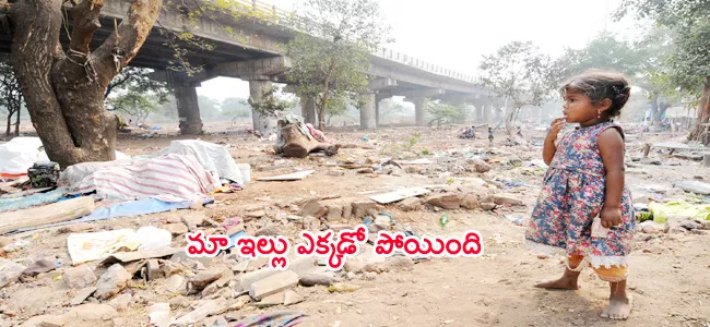 child searching for her Squatters - Sakshi