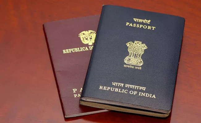 No Orange Coloured Passports. Government Scraps Decision - Sakshi