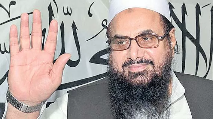 Hafiz Saeed slaps Rs 100 million 'defamation' notice on Pak defence minister - Sakshi