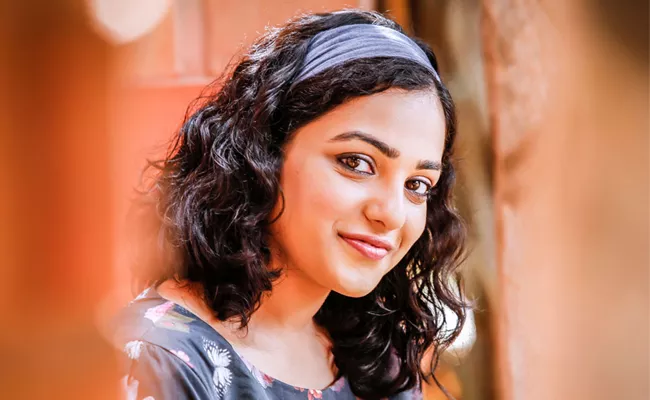 Nitya menon in Nizar Shafi Debut Movie - Sakshi