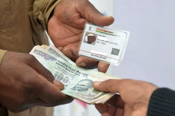 Aadhaar details available for Rs 500 - Sakshi