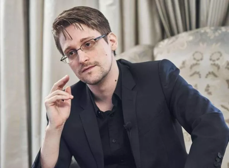 Arrest Aadhaar authorities, not journalist who exposed data breach: Edward Snowden - Sakshi