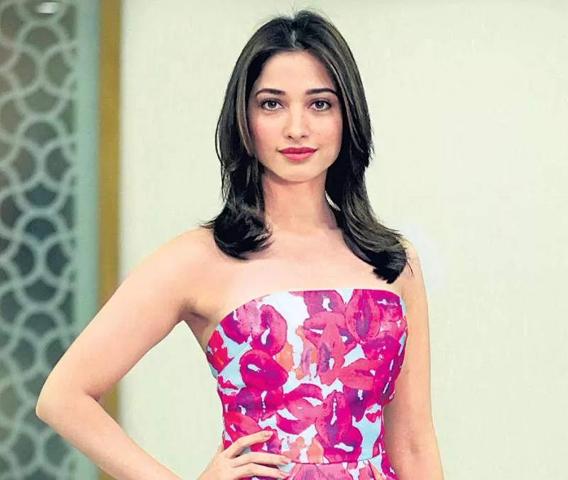 Tamanna on About Shoe Hurdle during Showroom Opening - Sakshi